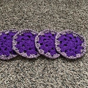 Handmade.  crochet coaster round purple.
